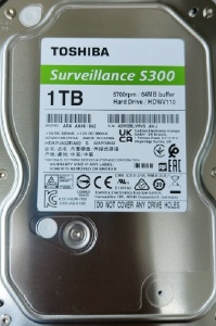 Жесткий диск 1000Gb Toshiba 64Mb SATA S300 HDWV110UZSVA/HDKPJ42ZRA02 5700 SURVEILLANCE для систем наблюдения цена и фото